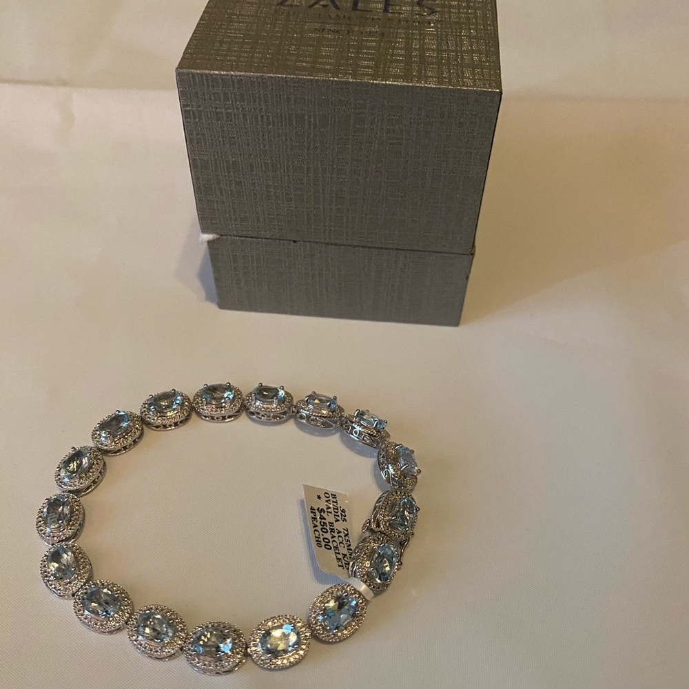Zales Blue Topaz and Diamond Accent Bracel…